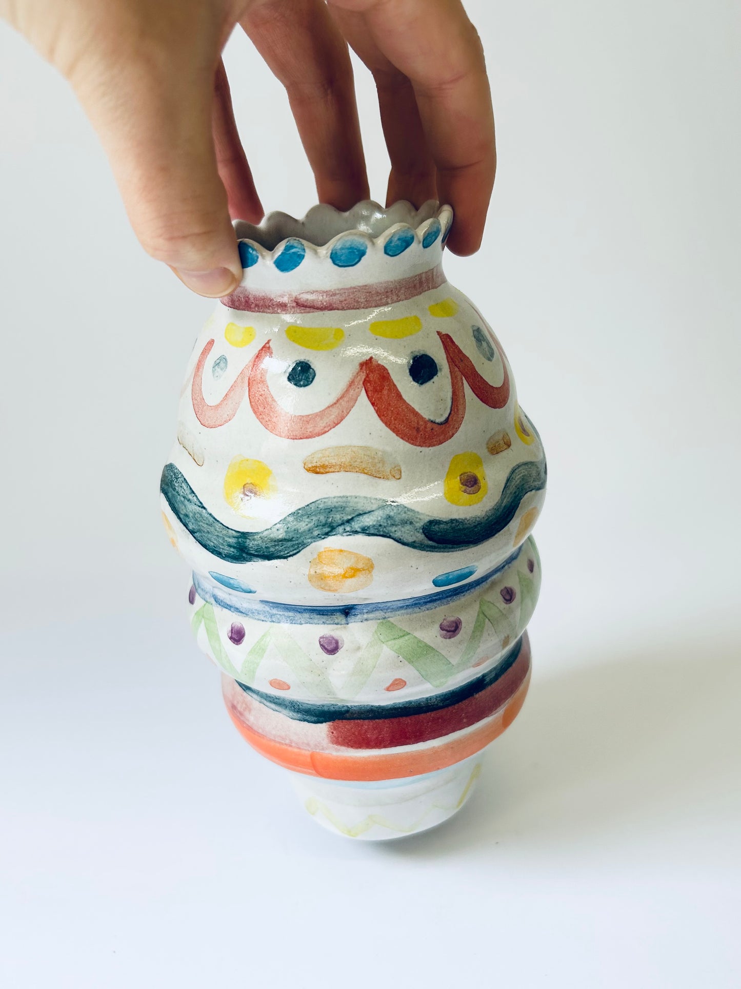 Scalloped edge colourful vase