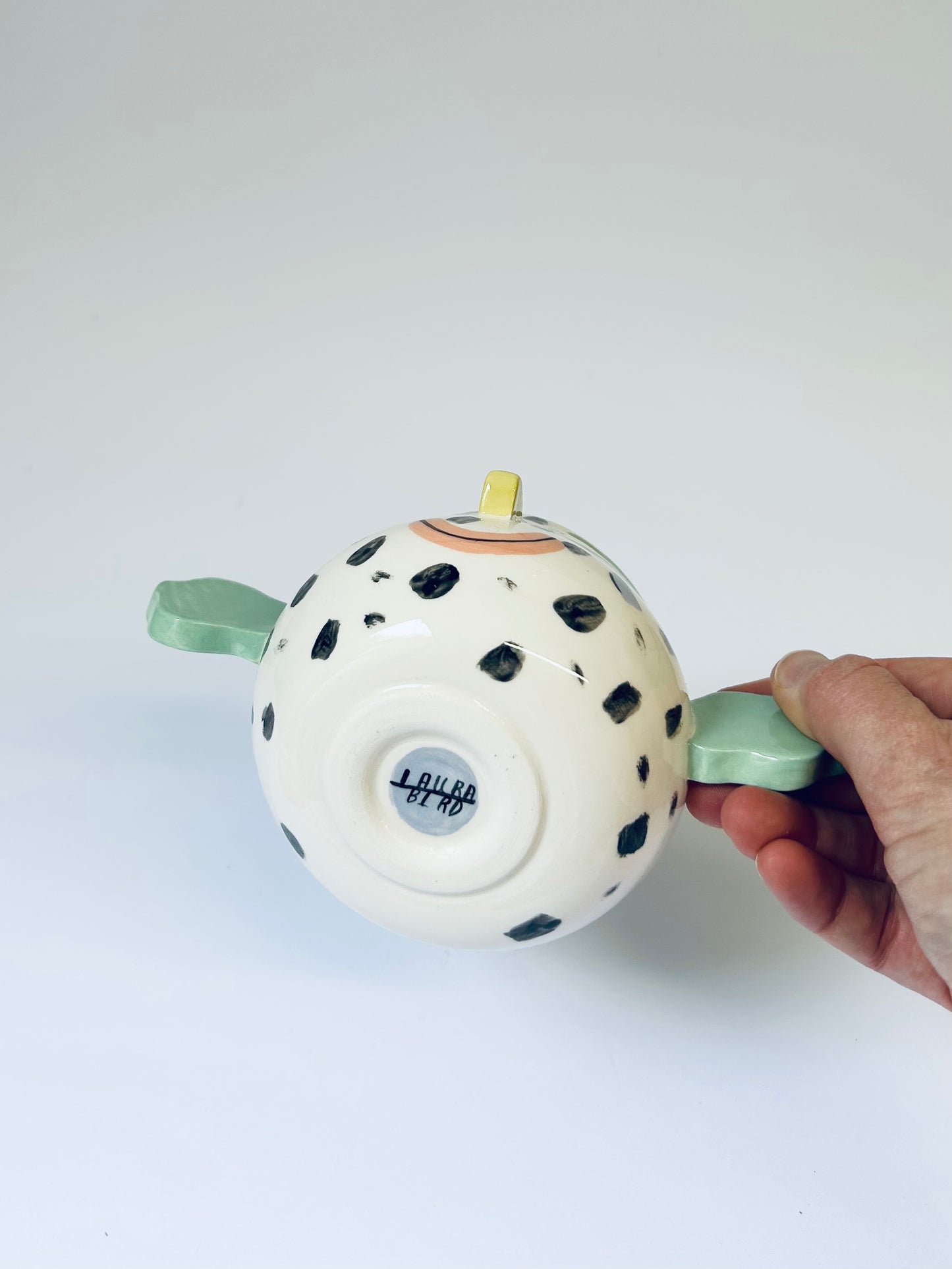 Spotty face pot