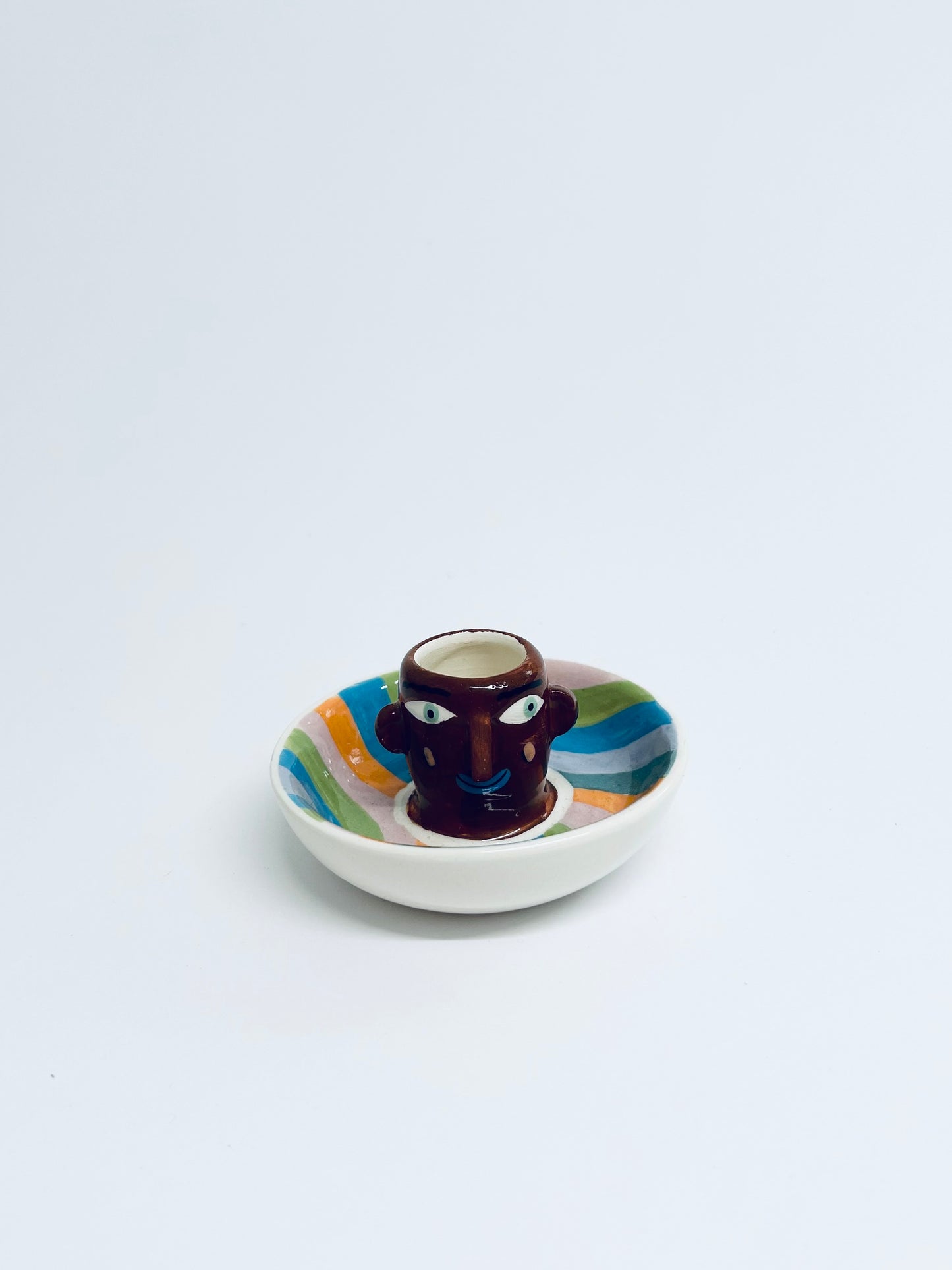Face candlestick holder