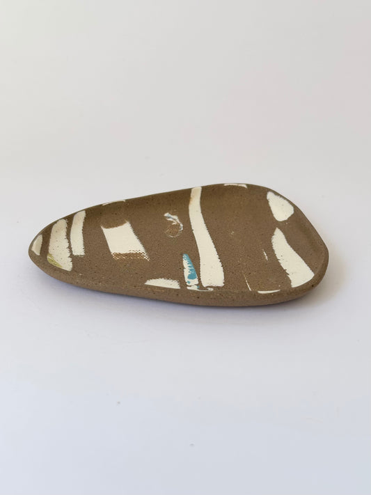 Small brown trinket dish with porcelain details